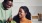 a man and a woman looking at a green object