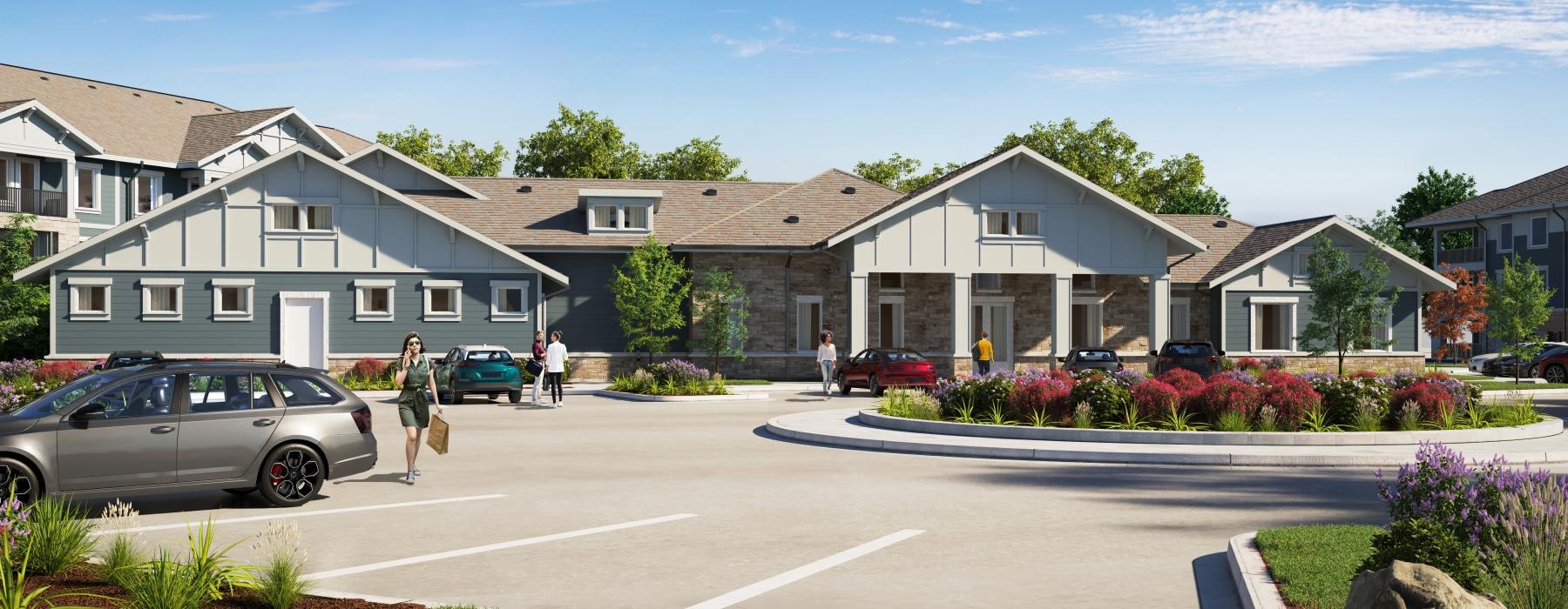 a group of houses with cars parked in front of them